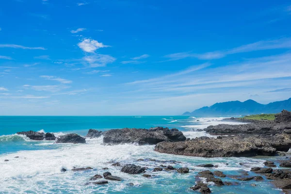 Panoramic view of beautiful sea level with reef rocks under fantasy blue cloudy and sunshine sky in Sansiantai Taitung, Taiwan — Stock Photo, Image