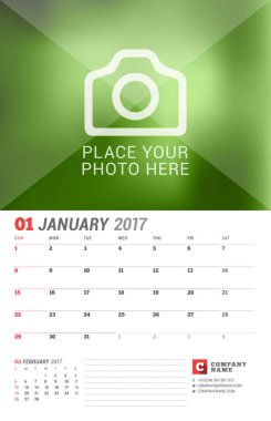 Duvar takvimi planlayıcısı 2017 yıl için. Vektör yazdırma şablonu fotoğraf için bir yer. Hafta Pazar günü başlar. Sayfa 2 ay. Ocak