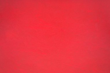 Arka plan olarak kahverengi taneli deri dokusu. Doğal malzeme, üst görünüm.