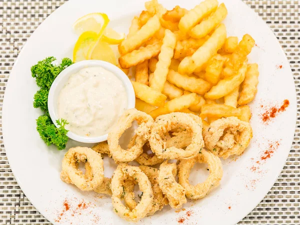 Fried calamari with sauce — Stock Photo, Image