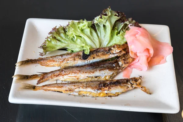 Grilled shishamo on plate — Stock Photo, Image