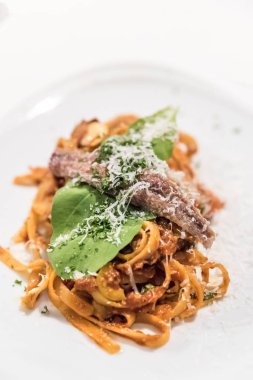 Spaghetti la puttanesca with anchovy clipart