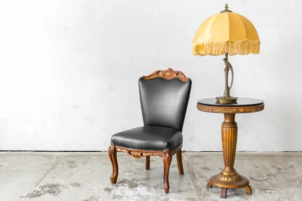 Black chair with lamp — Stock Photo, Image