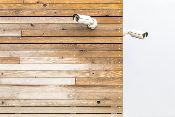 Security Camera CCTV on wooden wall — Stock Photo, Image