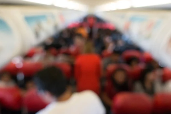 民間航空機の旅行者の背景をぼかした写真 — ストック写真