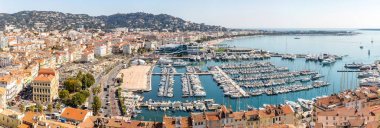 aerial view of Le Suquet- the old town and Port Le Vieux of Cannes, France Panorama clipart