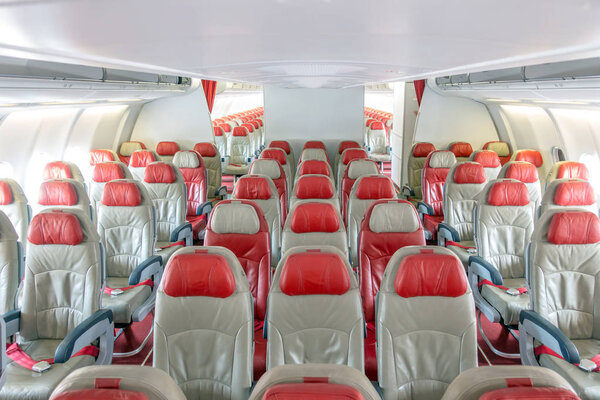 Empty passenger airplane with economy seats in the cabin