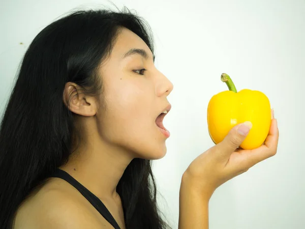 Asian woman and Pepper Stock Image