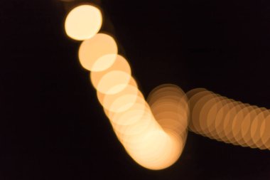 Renkli arka plan aydınlatma bokhe içinde belgili tanımlık karanlık ile