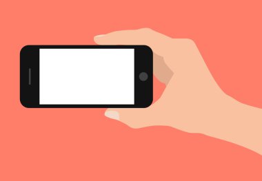 Akıllı telefon kırmızı arka plan üzerinde tutan el