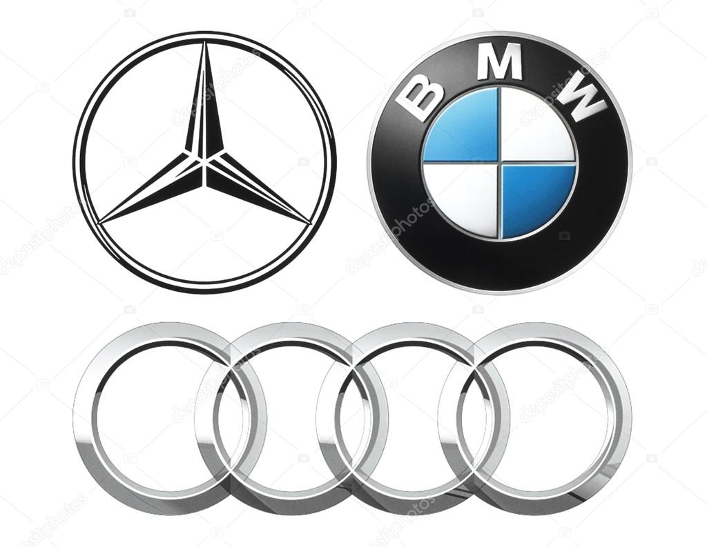 Kiev, Ukraine - September 12, 2016: Collection of popular German car logos printed on white paper: Mercedes, BMW and Audi