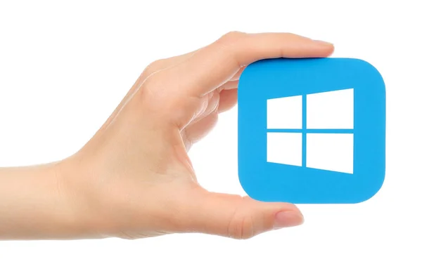 Mano sostiene Microsoft Windows sobre fondo blanco —  Fotos de Stock