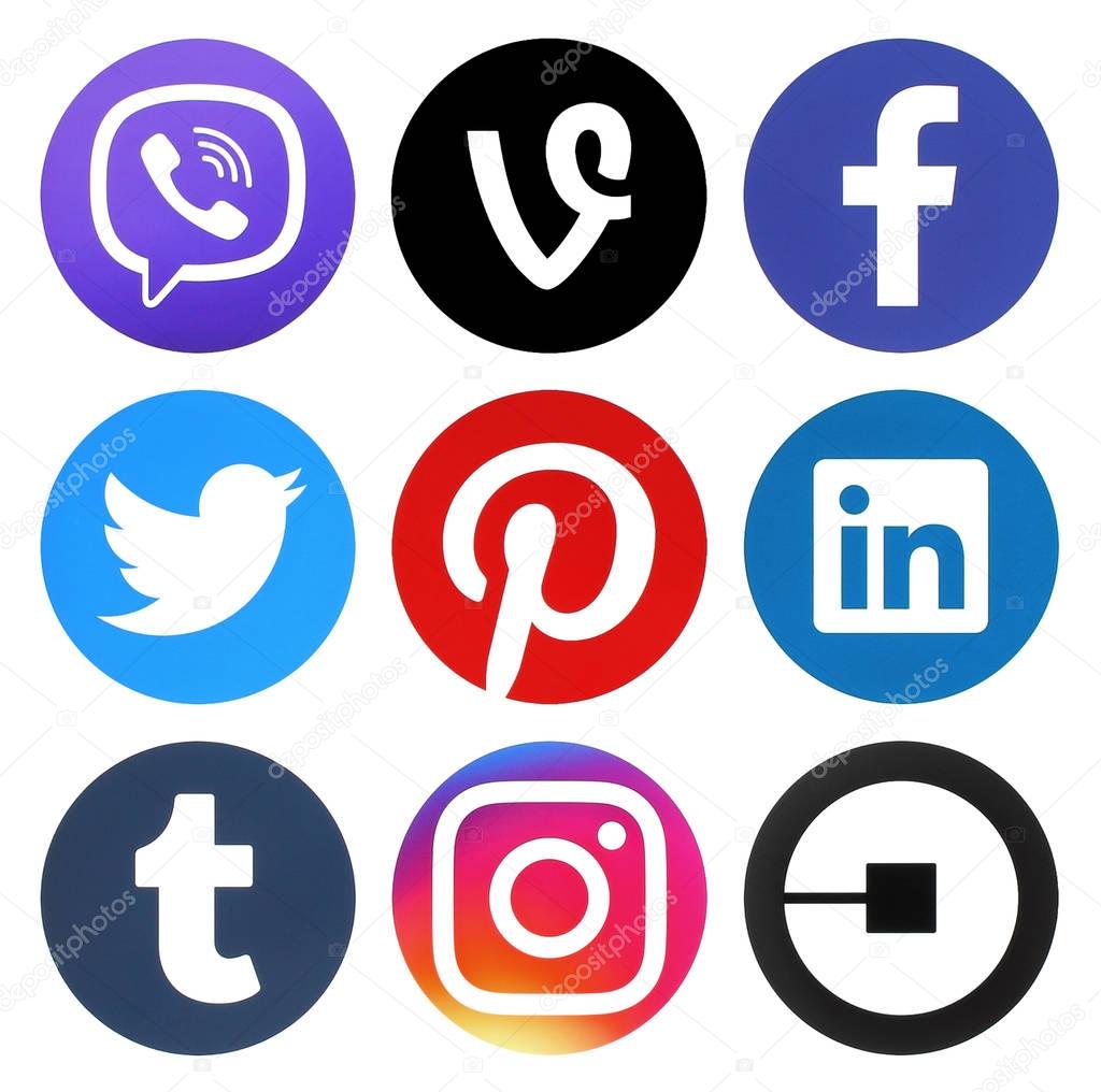 Kiev, Ukraine - February 28, 2017: Collection of popular social media round logos printed on paper: Facebook, Vine, Viber, Instagram, Linkedin, Twitter, Pinterest, Tumblr and Uber