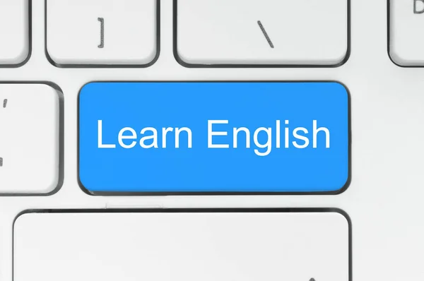 Mavi düğme üstünde belgili tanımlık klavye İngilizce kelime öğrenmek — Stok fotoğraf