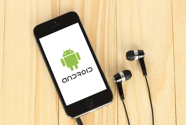 Phone with Android logotype on its screen — Stock Photo, Image