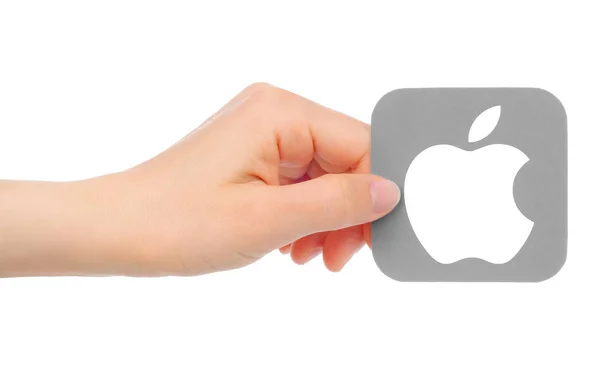 Mano sostiene icono de Apple — Foto de Stock