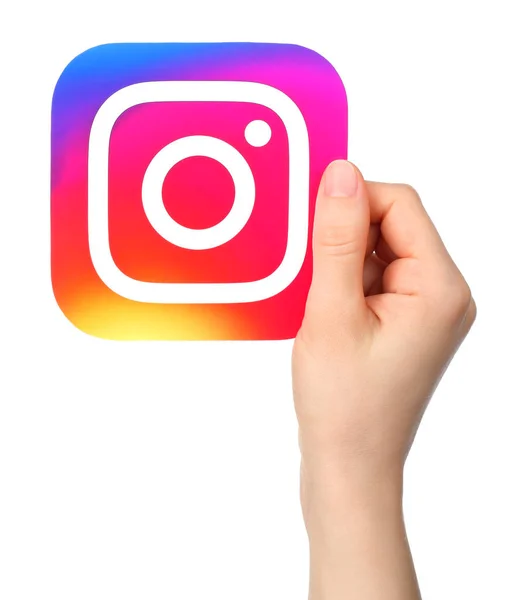 Hands holds Instagram icon — Stock Photo, Image