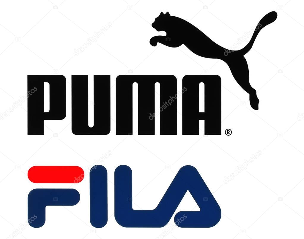 Kiev, Ukraine - September 11, 2017: Collection of popular sportswear manufactures logos printed on paper: Puma and Fila