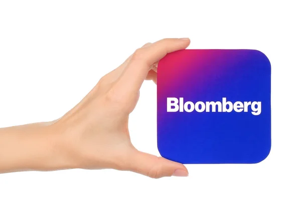 Hand håller Bloomberg ikonen — Stockfoto