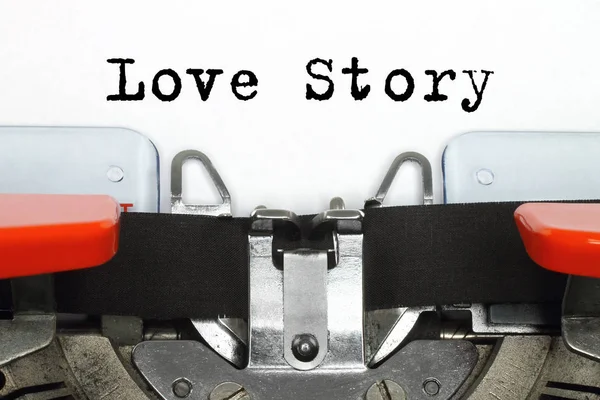 Parte della macchina da scrivere con parole di Love Story digitate — Foto Stock