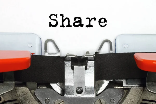 Parte da máquina de digitação com palavra Share digitada — Fotografia de Stock