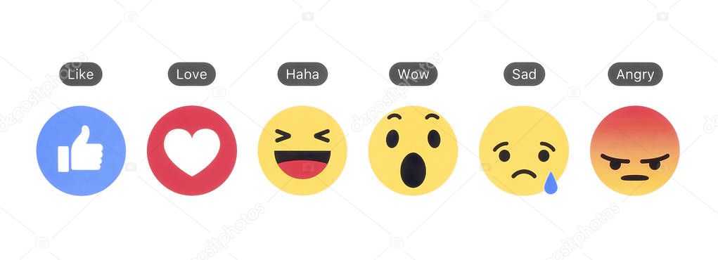 Kiev, Ukraine - December 06, 2017: Facebook like button and Empathetic Emoji Reactions printed on white paper. Facebook is a well-known social networking service