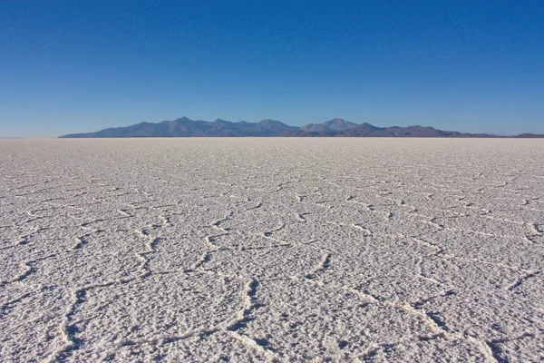 Textura de sal da terra salina Salar de Uyuni na Bolívia — Fotografia de Stock
