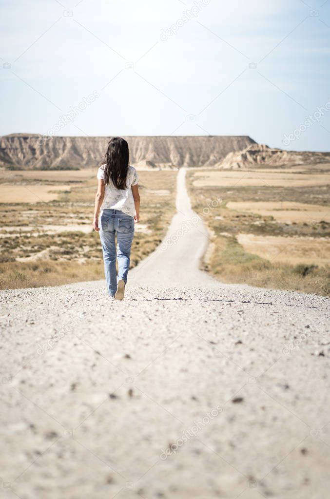 Woman with jeans walking