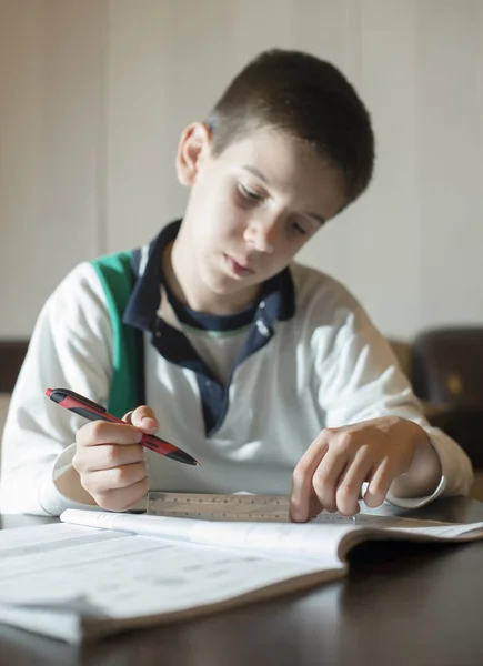 Boy doing  his homework — Stock Photo, Image