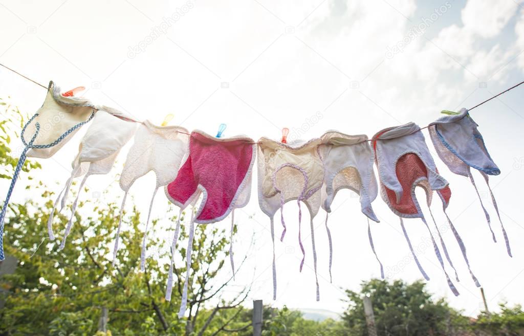 Baby bibs on laundry