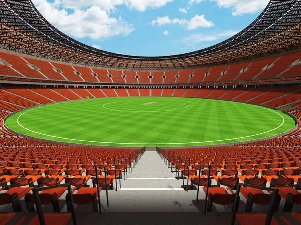 Beautiful modern  round cricket stadium with orange seats and VIP boxes for fifty thousand fans