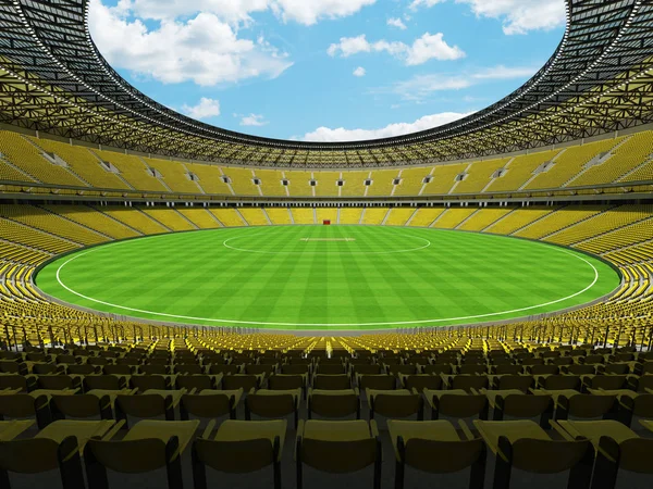 Красивий сучасний круглий крикетний стадіон з жовтими сидіннями та VIP-коробками для п'ятдесяти тисяч фанатів — стокове фото
