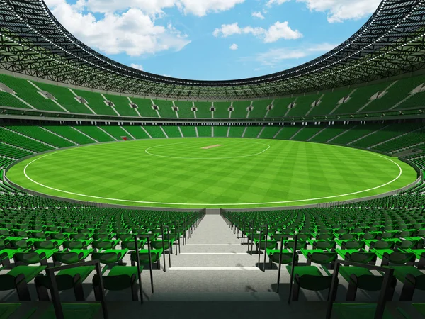 Красивий сучасний круглий крикетний стадіон з зеленими сидіннями та VIP-коробками для п'ятдесяти тисяч фанатів — стокове фото