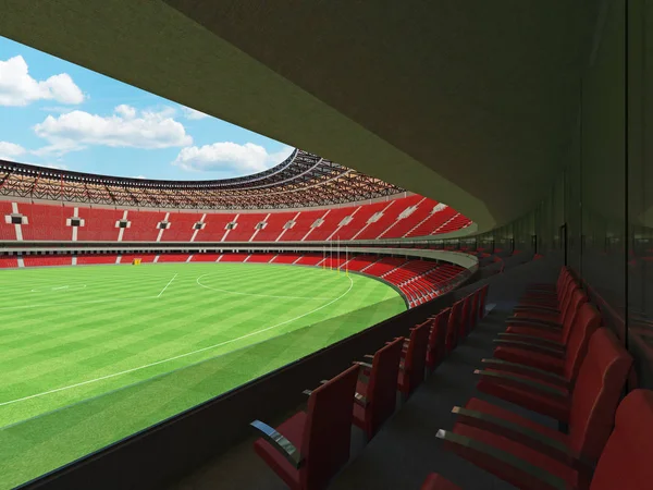 Hermoso moderno redondo australiano reglas estadio de fútbol con sillas rojas y cajas VIP para cincuenta mil fans —  Fotos de Stock