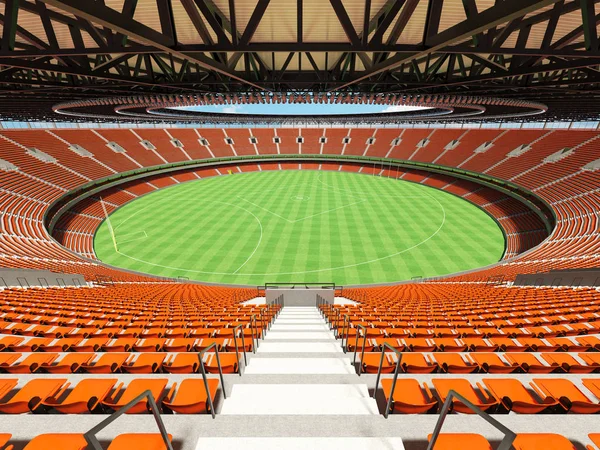 Bela rodada moderna australiana regras estádio de futebol com cadeiras laranja e caixas VIP para cinquenta mil fãs — Fotografia de Stock