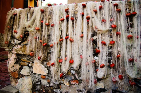 balık ağlarına turistik alana Cenova İtalya boccadasse olarak bilinen bir duvar kurutma