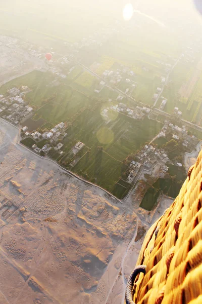 Luxor Desert and Green Fields, Top View from Hot Air Balloon