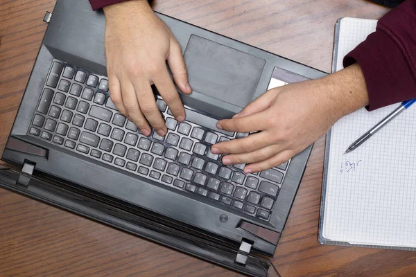 Closeup on Hands Typing on Keyboard, Notebook and Pen — Stock Photo, Image