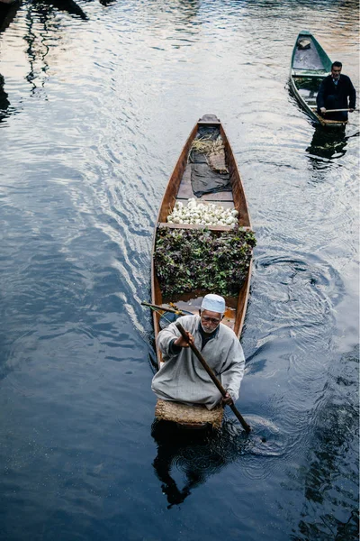 Men on boats in lake — Stock Photo, Image