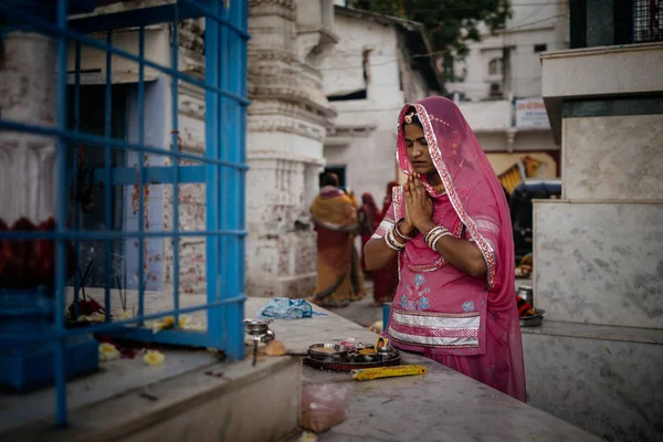 Woman doing religious ritual
