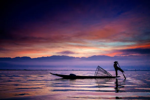 Man on boat with cone — Stock Photo, Image