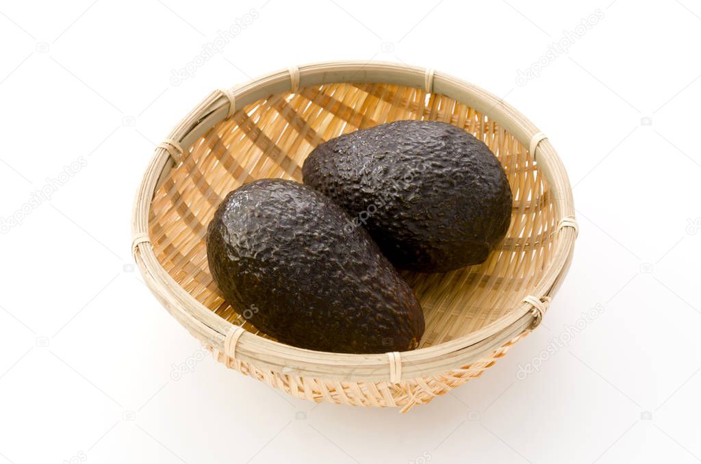 Avocado in a bamboo sieve