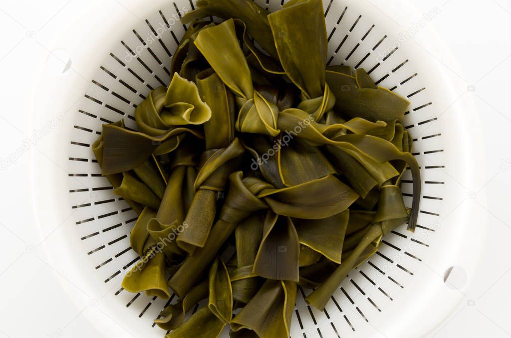 MusubiKombu,Kombu kelp is a large brown algae seaweed. It is an edible seaweed used extensively in Japanese cuisine