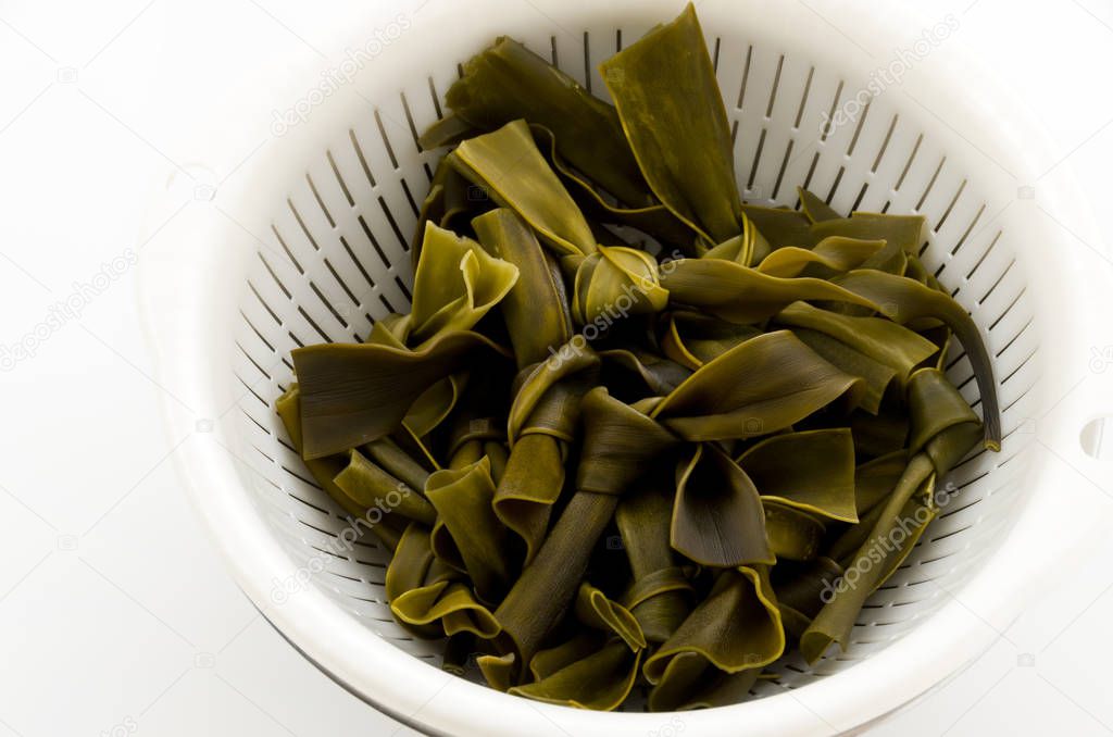 MusubiKombu,Kombu kelp is a large brown algae seaweed. It is an edible seaweed used extensively in Japanese cuisine