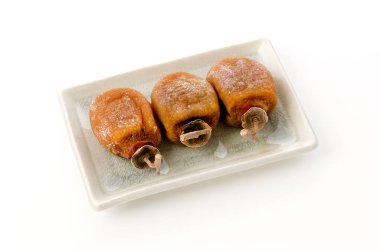 Anpokaki, tabakta kurutulmuş hurma.