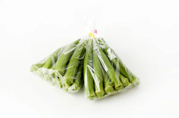 Fresh Okra Plastic Bag White Background — Stock Photo, Image