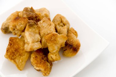 Domuz eti yemek, domuzderisi, domuz çizilmemesi veya domuz eti çatırtı