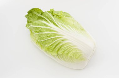 Napa cabbage or Chinese cabbage half, isolated white background clipart
