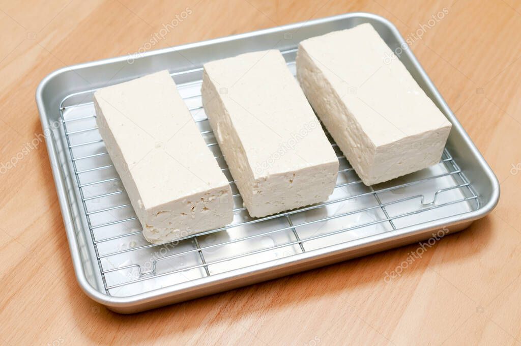 firm tofu on cooking aluminum tray