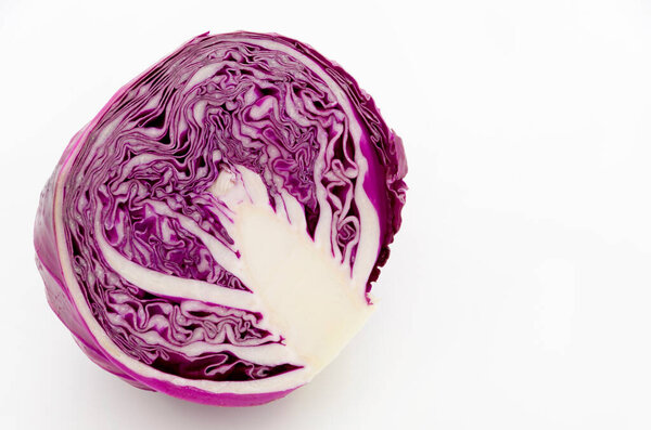 Sliced purple cabbage isolated on white background. 